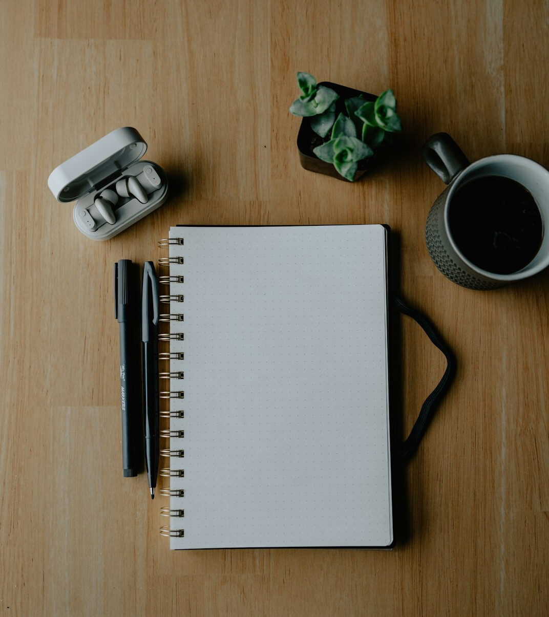 Interview setup with a microphone and notebook